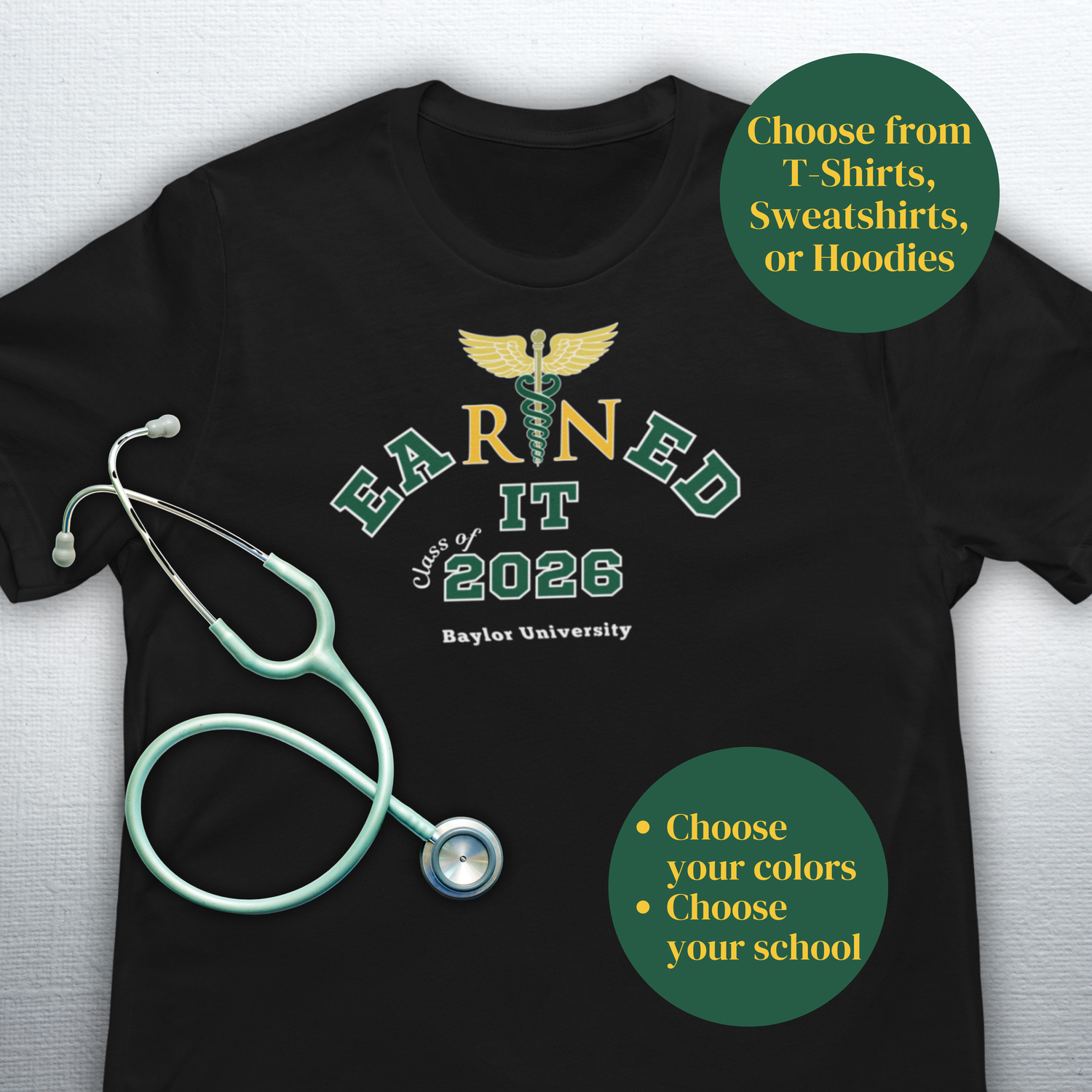 Black t-shirt with 'EARNED IT Class of 2026 Baylor University' design and stethoscope on a white background